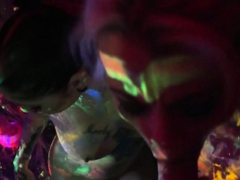 Black-light Babes Nadia And Ophelia Suck Off A Colorful Cock